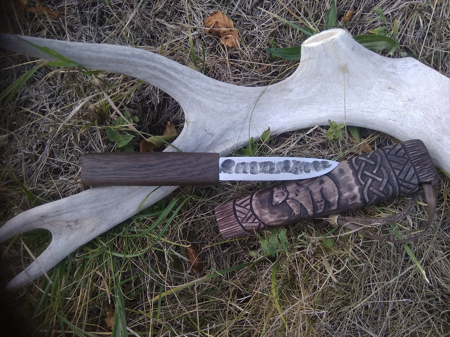 Small knife with wooden sheath