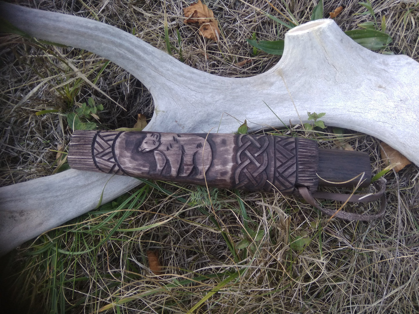 Small knife with wooden sheath