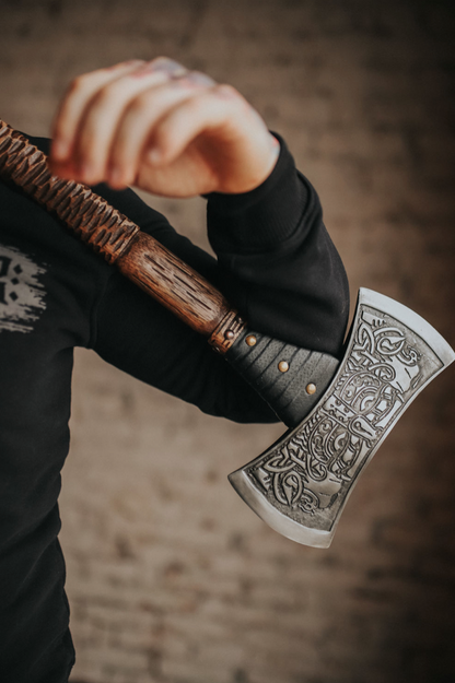 Double sided engraved axe