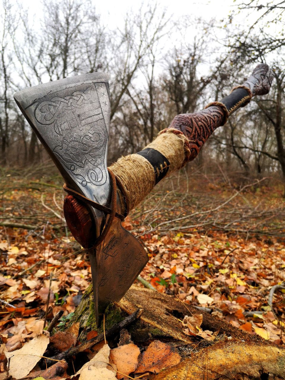 Double sided engraved axe