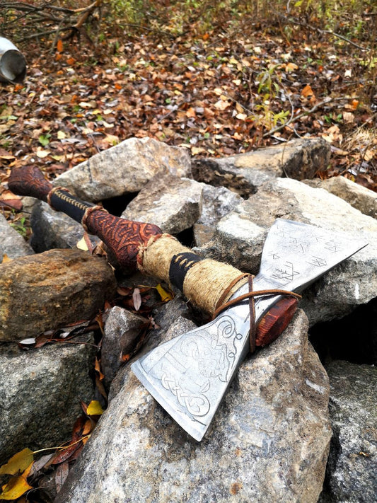 Double sided engraved axe