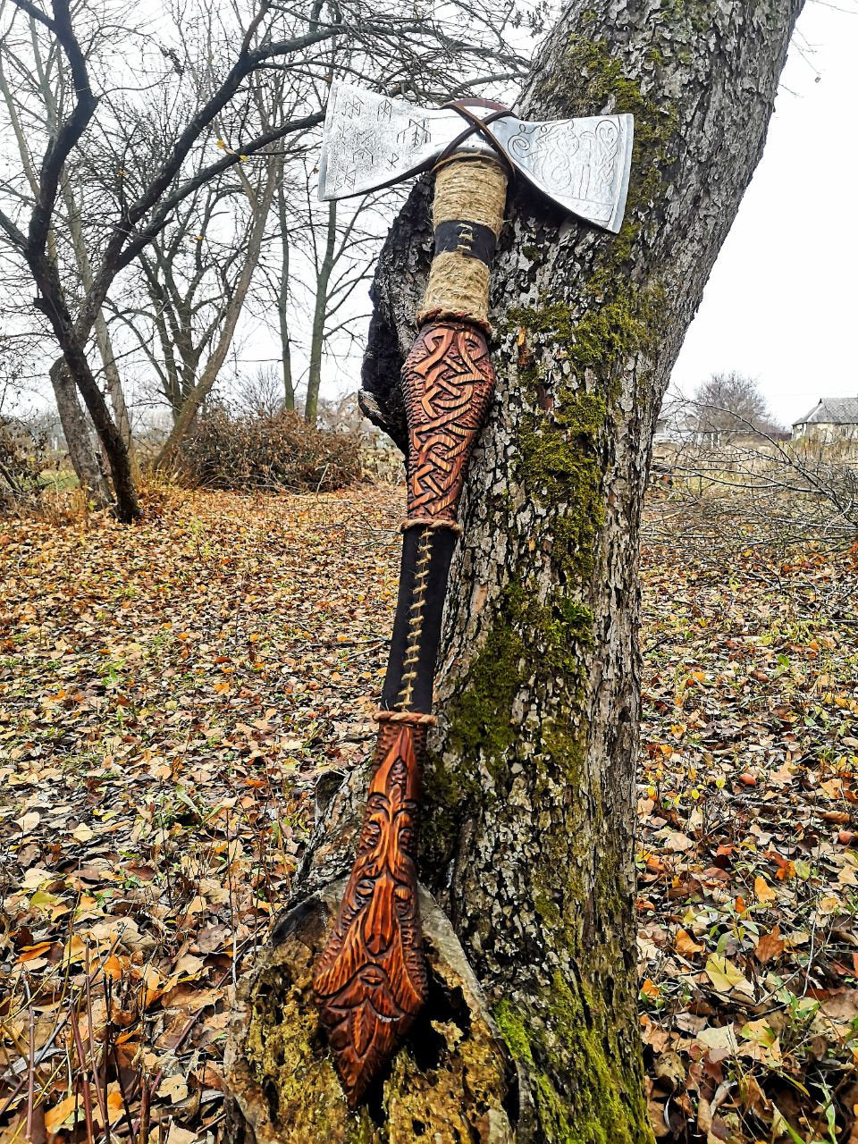 Double sided engraved axe